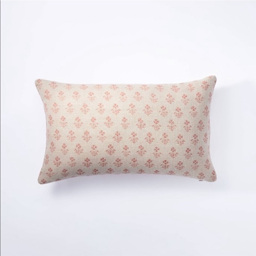 Threshold with Studio McGee floral print pillow.